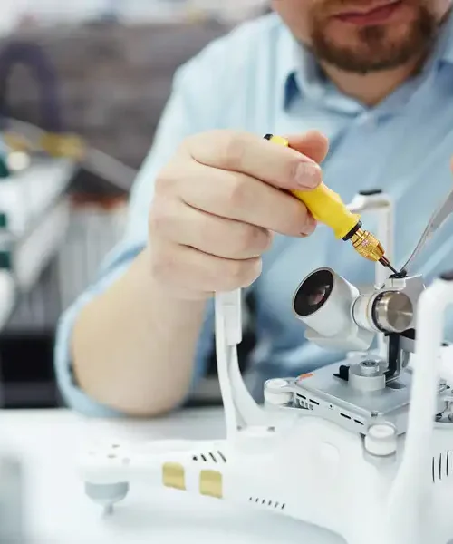 man-attaching-action-camera-drone-ezgif.com-jpg-to-webp-converter